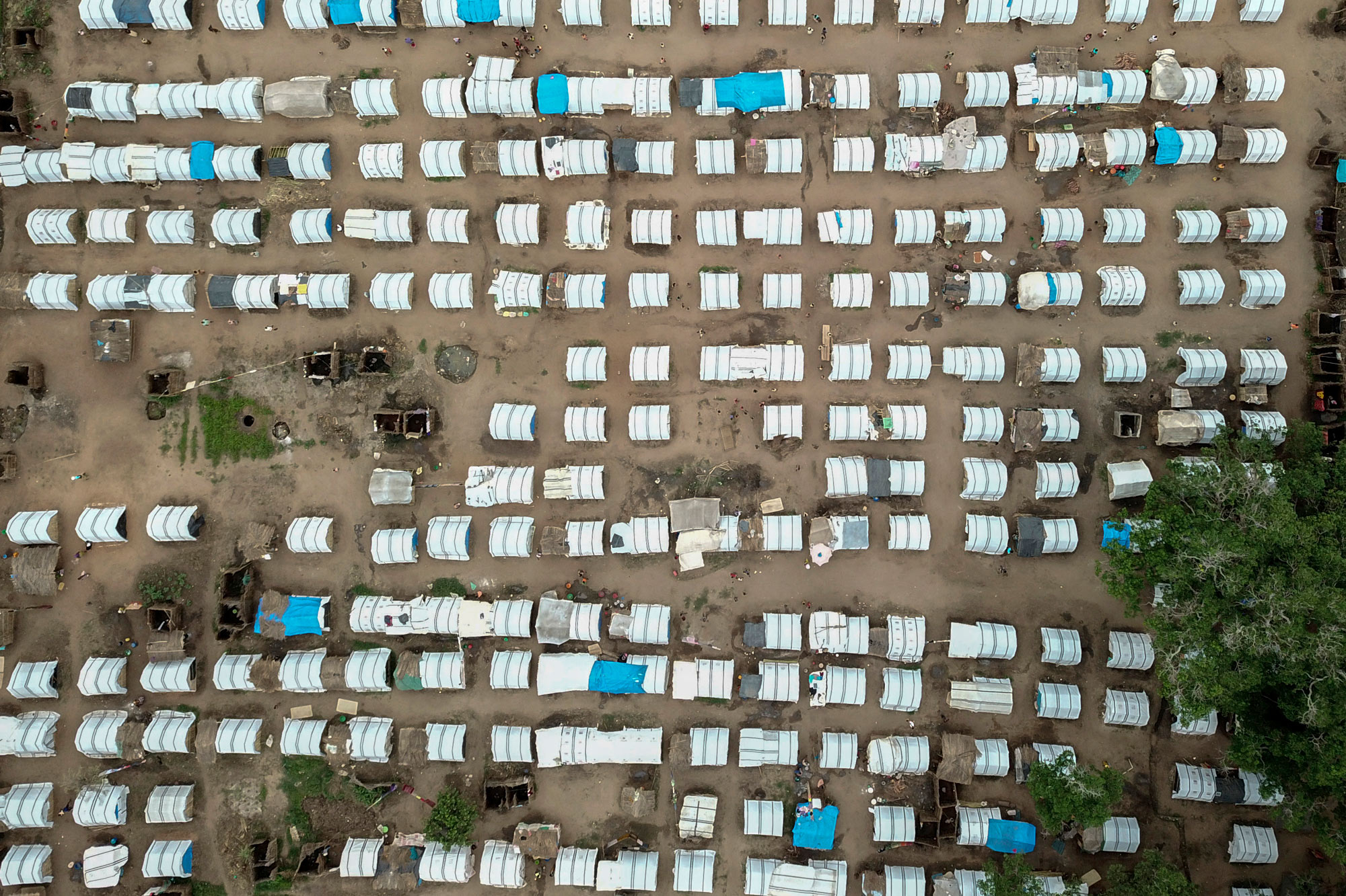 24 February 2021: An aerial view shows temporary housing for displaced people in the Napala Agrarian Center in the Metuge district in Cabo Delgado, Mozambique. (Photograph by Alfredo Zuniga/ AFP)