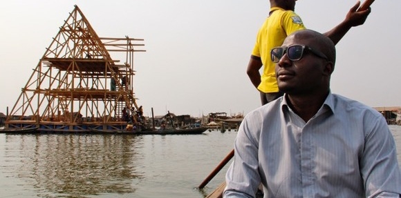 Architect Kunlé Adeyemi in early 2013 in front of the Floating School under construction. Credits: Femke van Zeijl