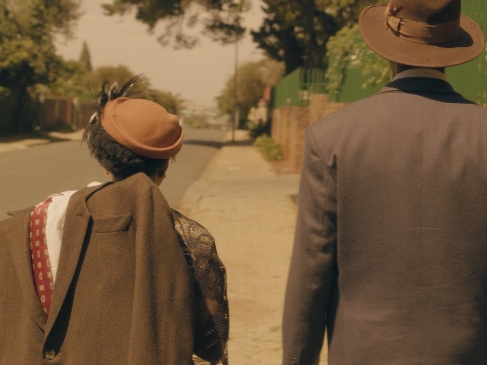 Film still from the Suit. Phuthi Nakene as Matilda and Atandwa Kani as Philemon.