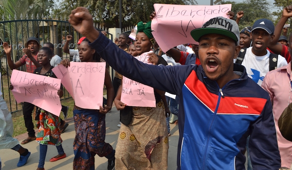  Protest in Luanda, Angola in July, 2015. Activist David Salei (right) was beaten by police during march and  got hospitalized. Photo: Maka Angola