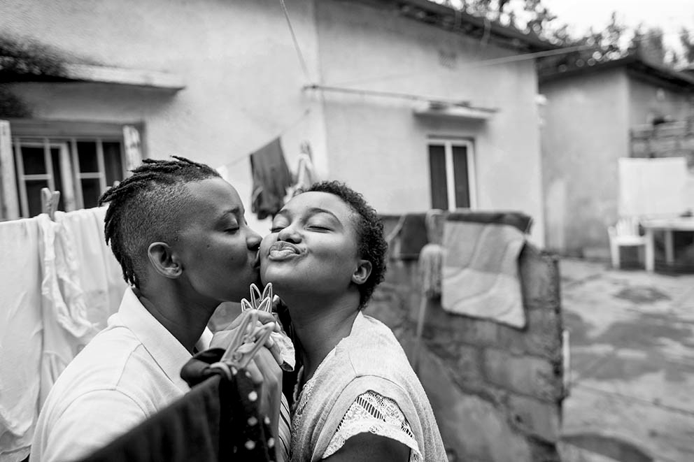 While drying the laundry this young couple finds their complicity, Maputo 2016. Series A Place to Call their Own